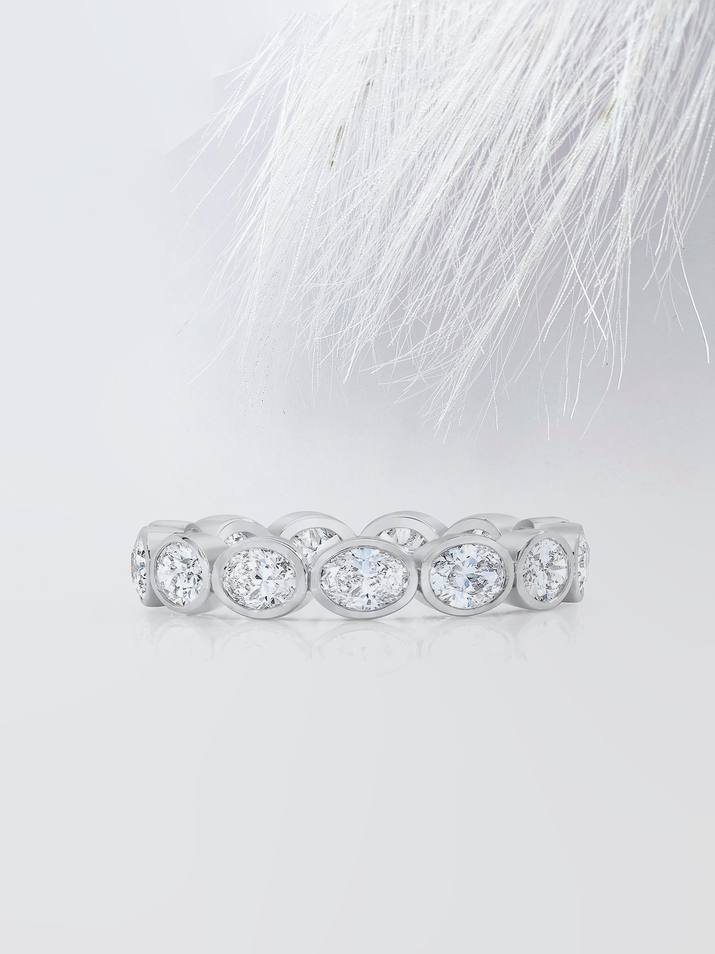 Oval Cut Bezel Diamond Wedding Band For Women