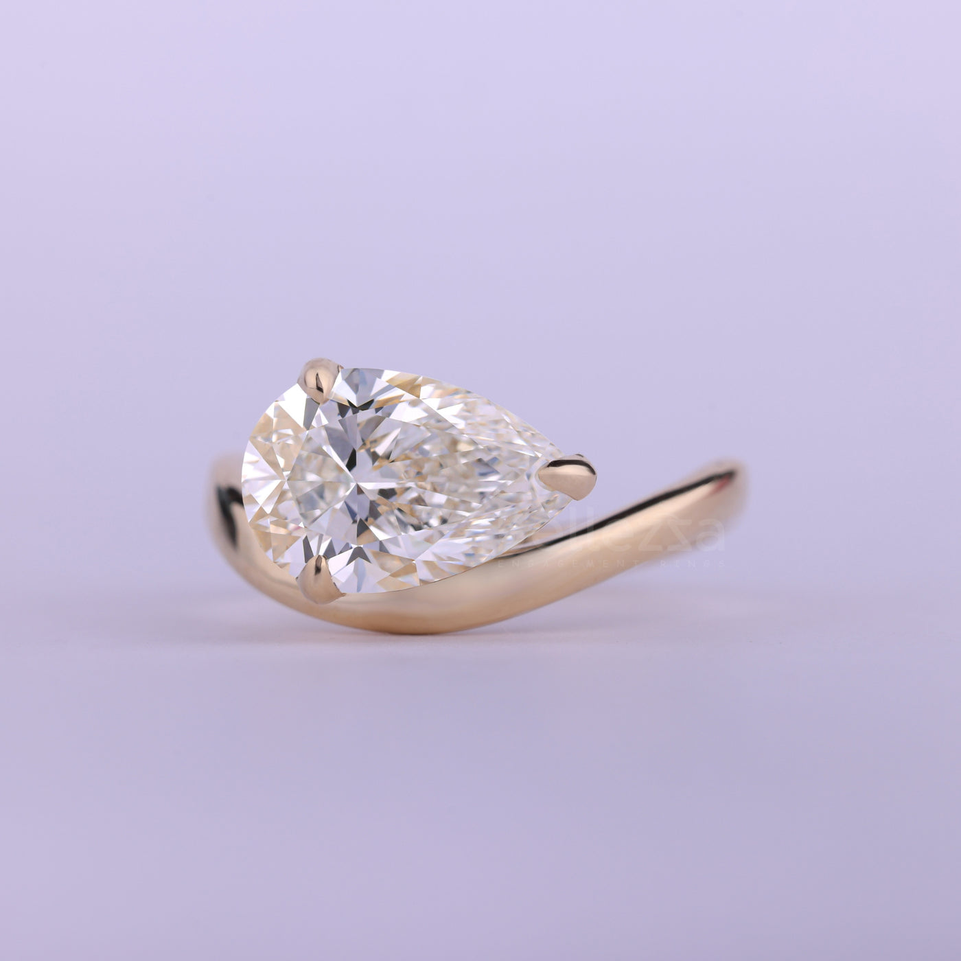 1.50CT East-West Pear Cut Curved Solitaire Engagement Ring