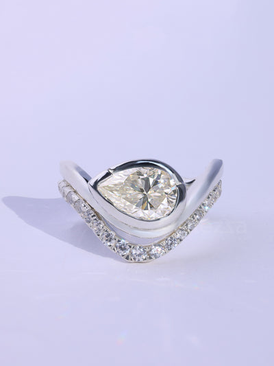 Pear Cut Unique Curved Moissanite Pave Set Engagement Ring Set