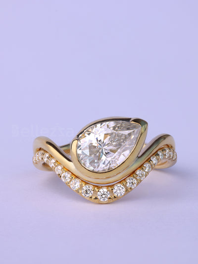 Unique Pear Cut Diamond Curved Moissanite Engagement Ring Set