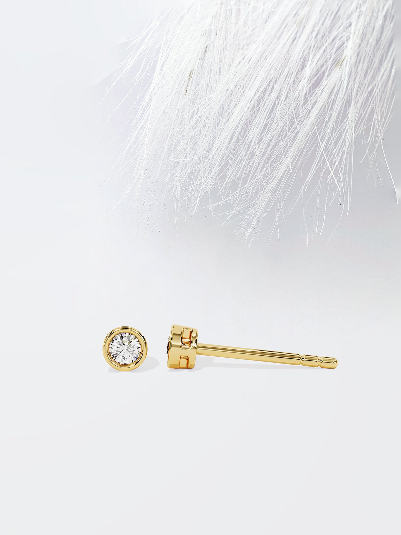 Round Cut Bezel Set Moissanite Stud Diamond Earrings in 14k Yellow Gold