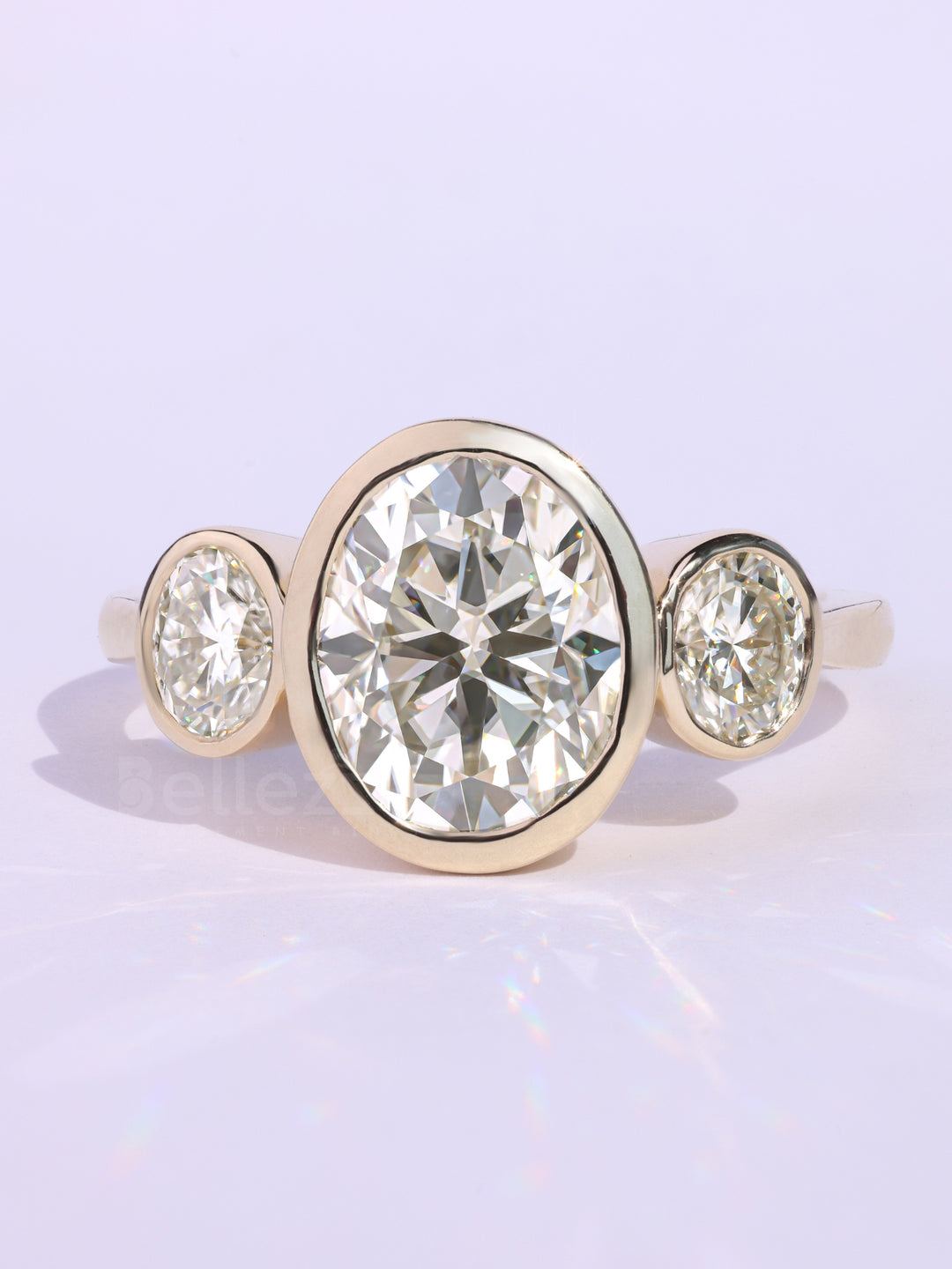 1.0CT Oval Cut Bezel Setting Three Stone Engagement Ring