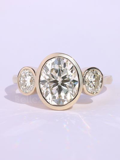 1.0CT Oval Cut Bezel Setting Three Stone Engagement Ring