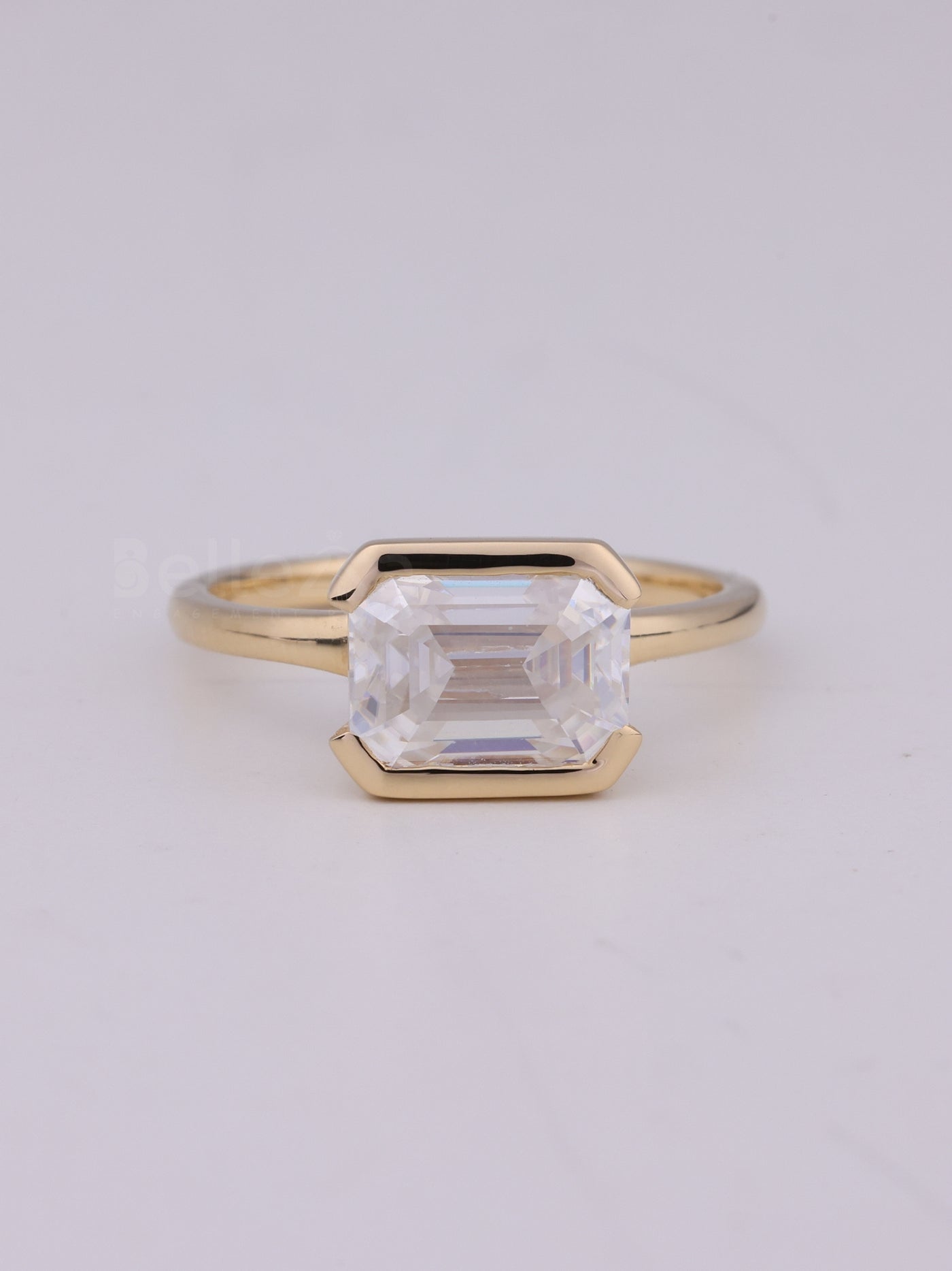 1.50CT East West Emerald Cut Half Bezel Engagement Ring