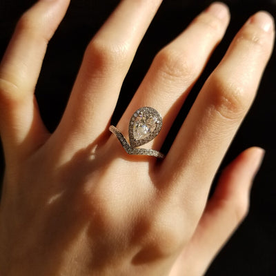 1-50-ct-pear-shaped-moissanite-halo-engagement-ring