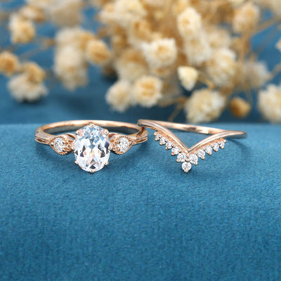 oval-shaped-moissanite-three-stone-bridal-set