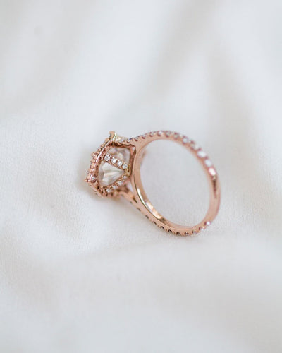 pear-cluster-halo-moissanite-engagement-ring