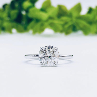 round-cut-solitaire-moissanite-engagement-ring