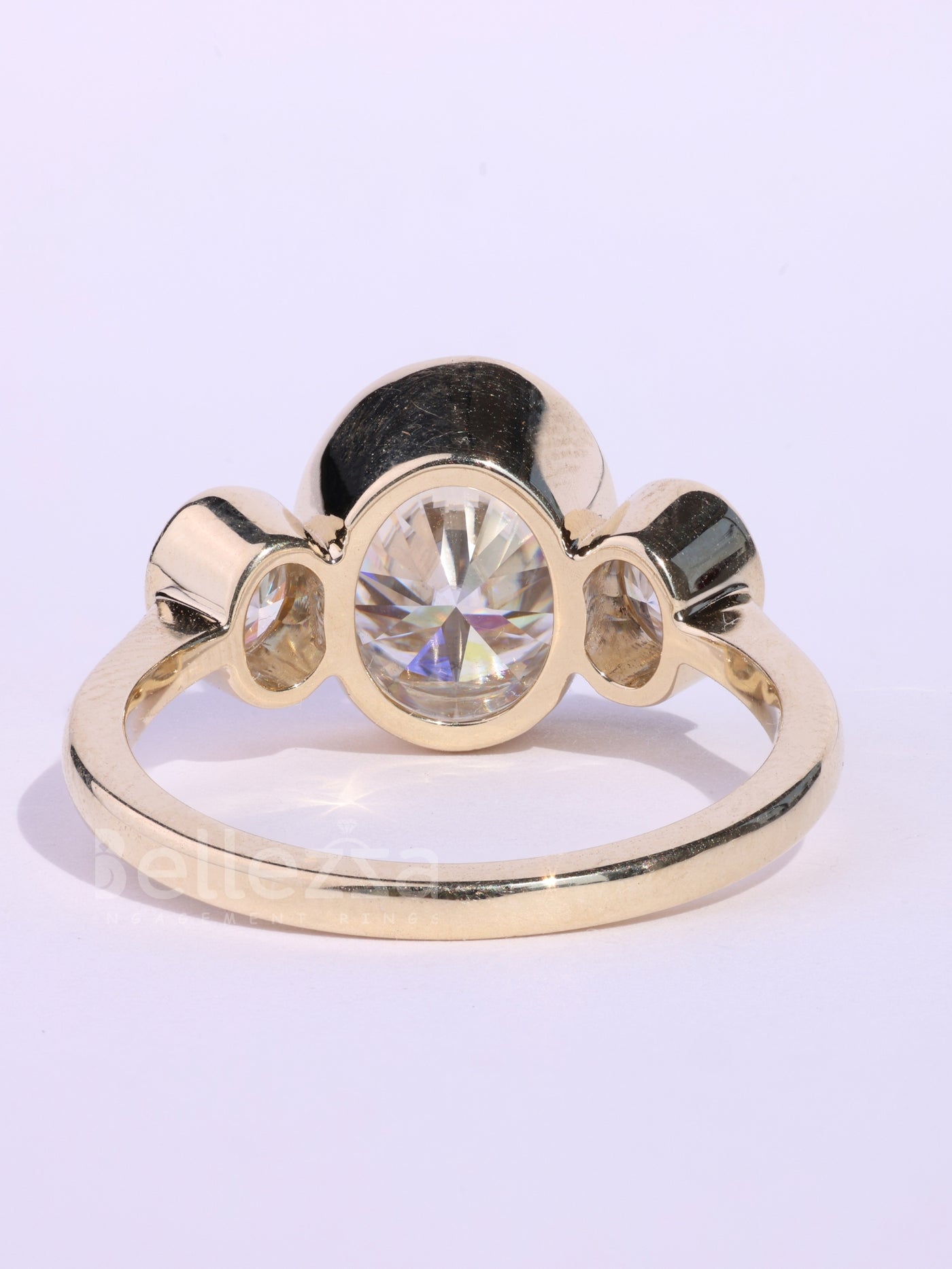 1.0CT Oval Cut Bezel Setting Three Stone Engagement Ring