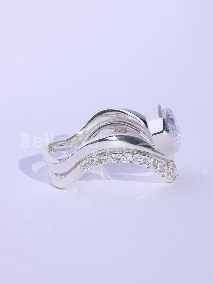 Pear Cut Unique Curved Moissanite Pave Set Engagement Ring Set