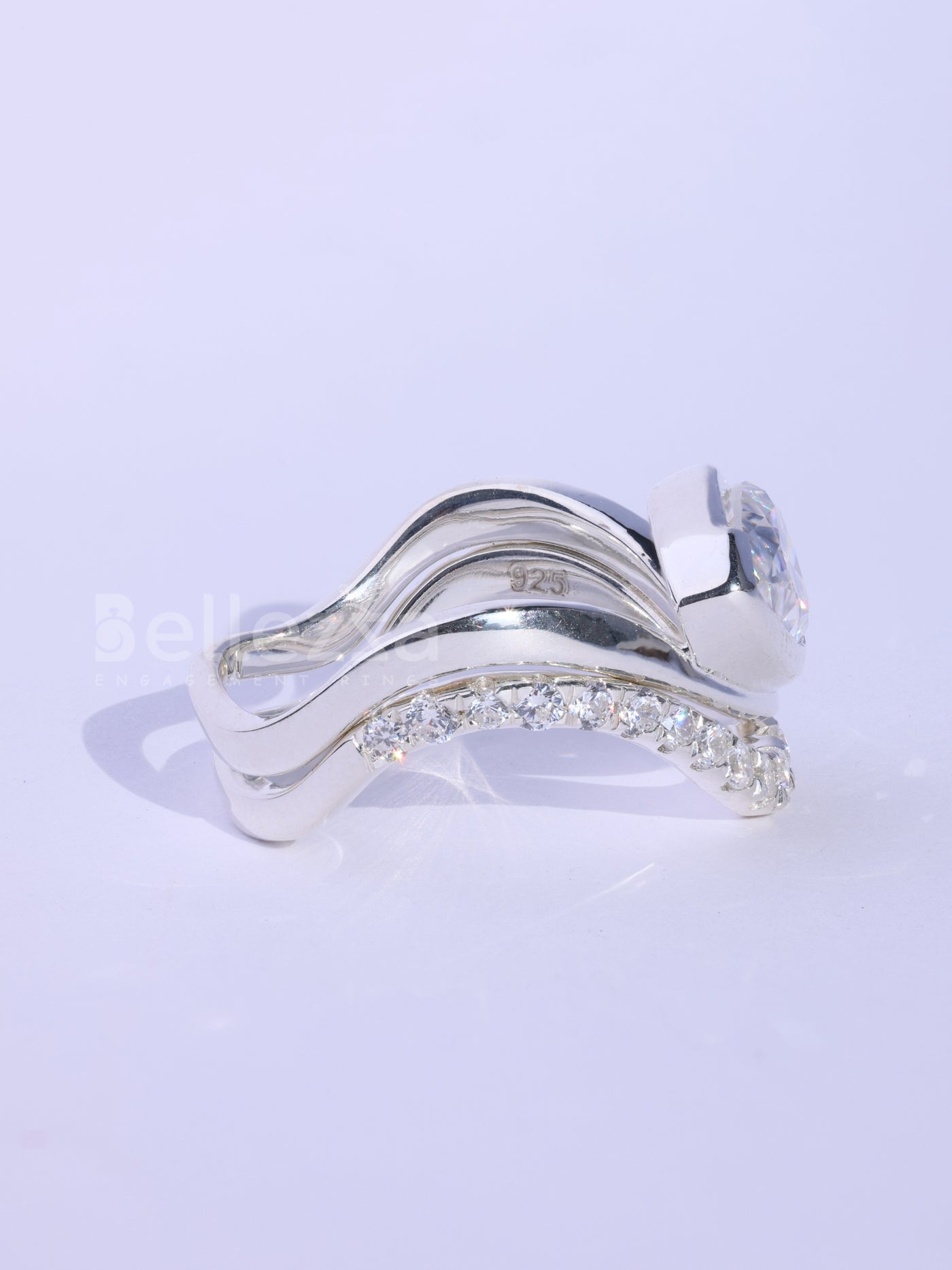 Pear Cut Unique Curved Moissanite Pave Set Engagement Ring Set