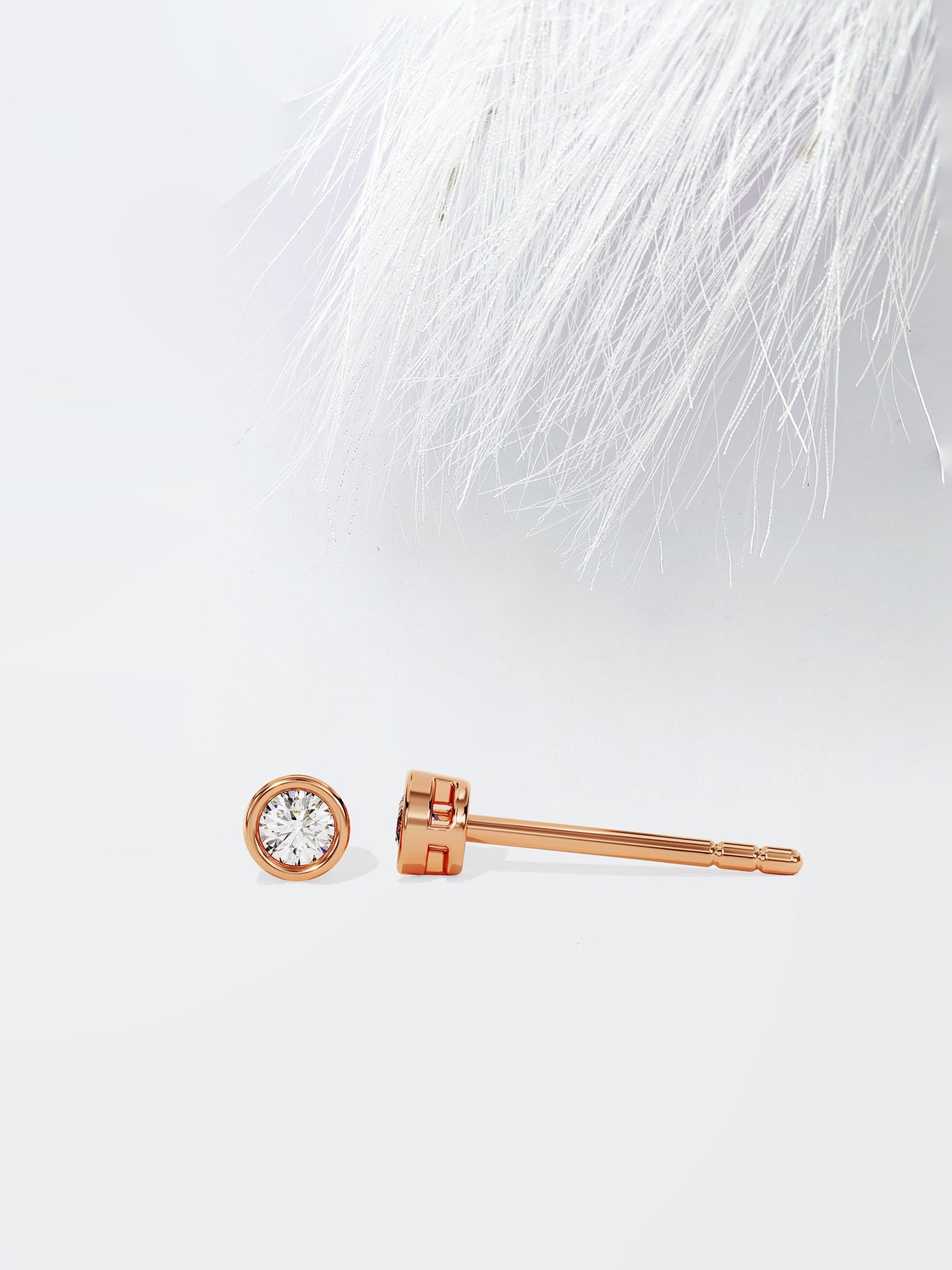 Round Cut Bezel Set Moissanite Stud Diamond Earrings in 14k Yellow Gold