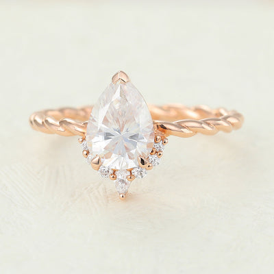 pear-shaped-moissanite-cluster-engagement-ring
