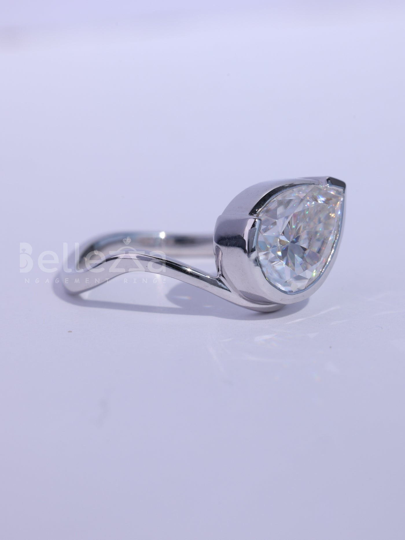 1.50CT Pear Cut Bezel Setting Curved Moissanite Engagement Ring