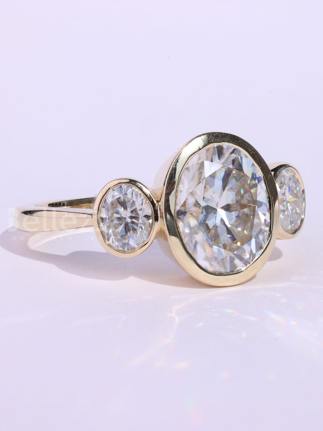 1.0CT Oval Cut Bezel Setting Three Stone Engagement Ring