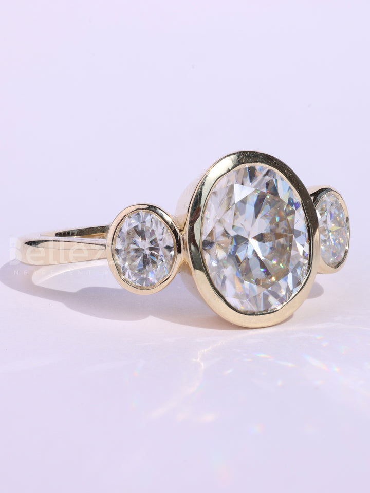 1.0CT Oval Cut Bezel Setting Three Stone Engagement Ring