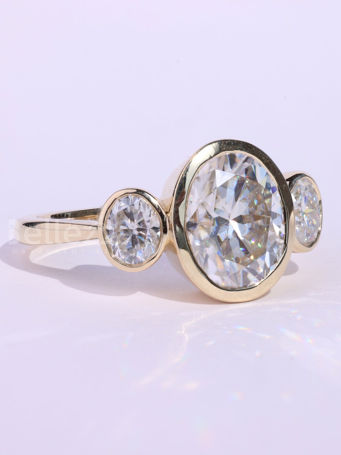 1.0CT Oval Cut Bezel Setting Three Stone Engagement Ring