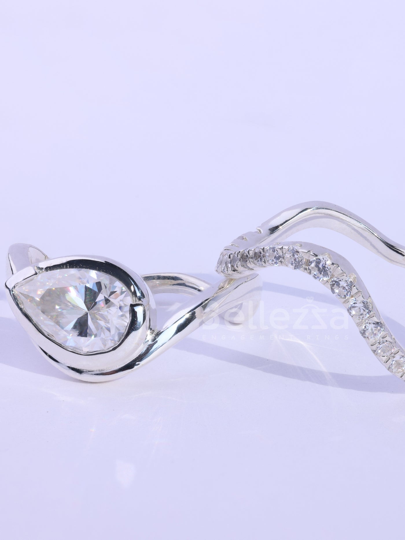 Pear Cut Unique Curved Moissanite Pave Set Engagement Ring Set