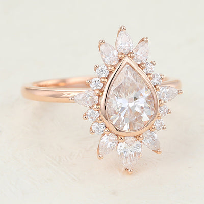 pear-shaped-moissanite-cluster-halo-engagement-ring