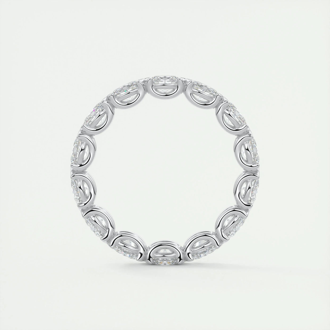 oval-cut-half-bezel-moissanite-bridal-wedding-band