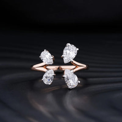 0.75 CT Pear Shaped Moissanite Four Stone Engagement Ring