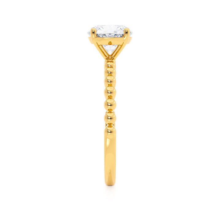round-shaped-moissanite-solitaire-bubble-prong-engagement-ring