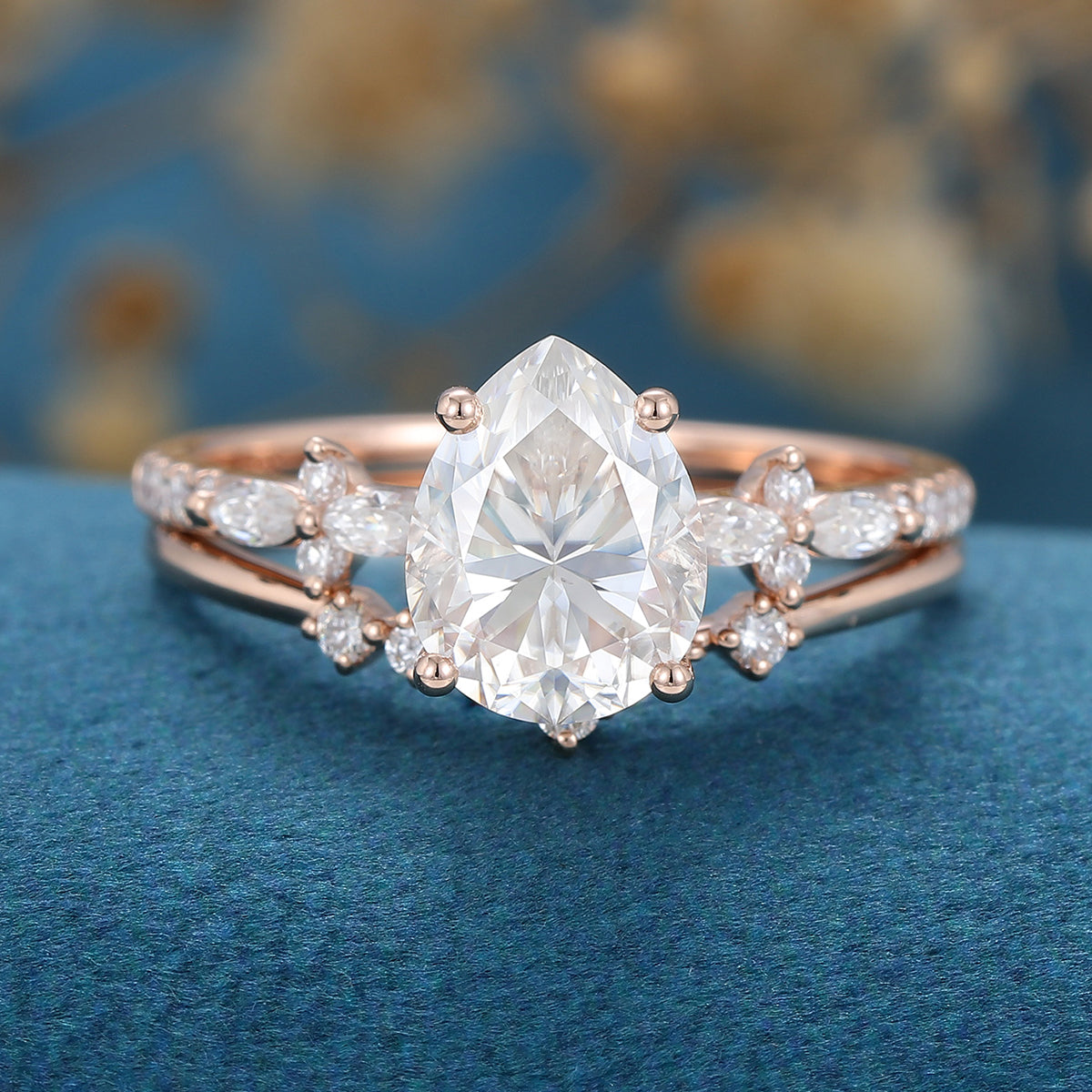 pear-shaped-moissanite-solitaire-pave-bridal-set