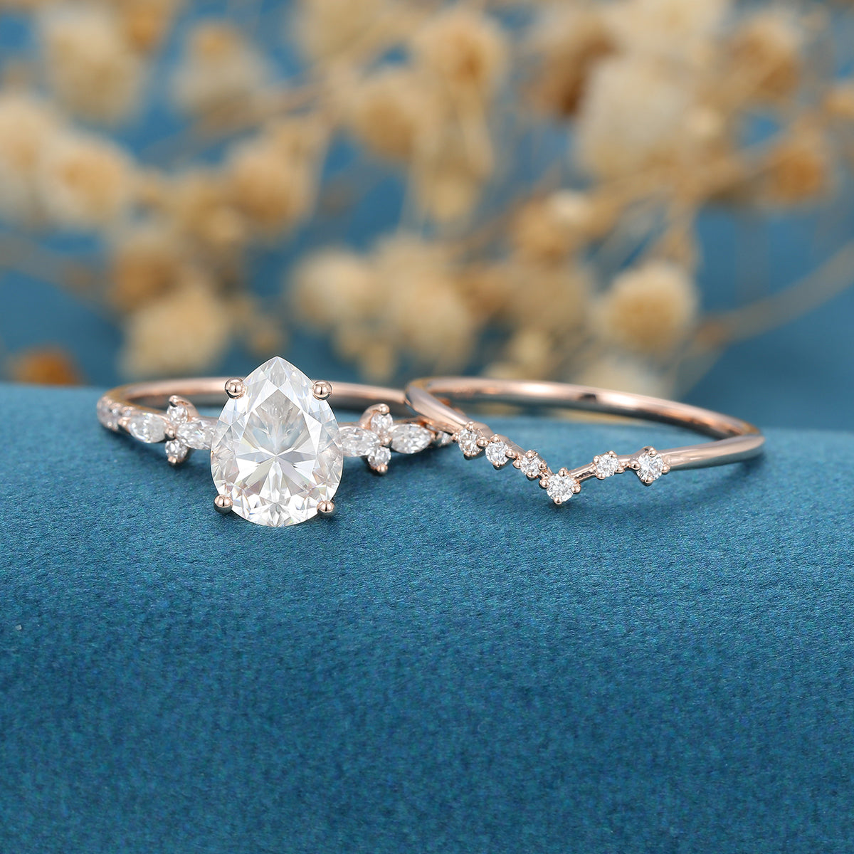pear-shaped-moissanite-solitaire-pave-bridal-set