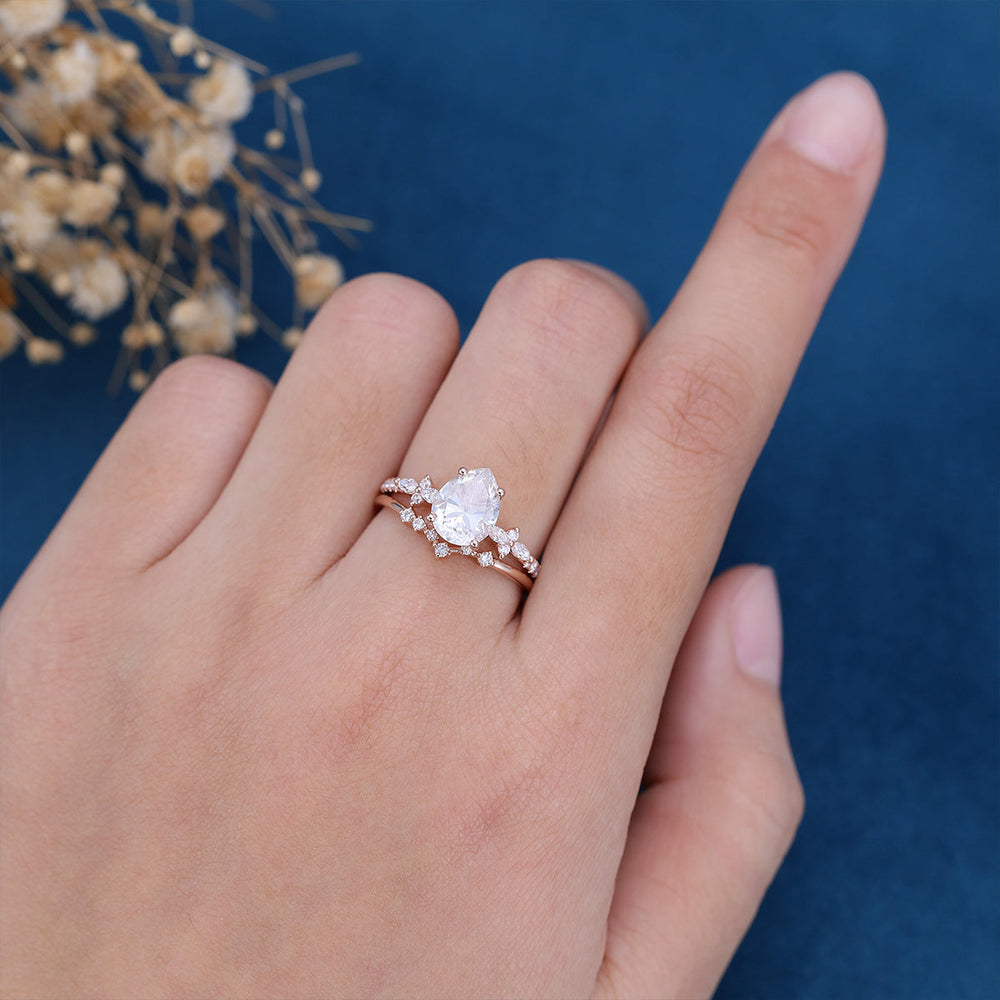 1-50-ct-pear-shaped-moissanite-solitaire-pave-bridal-set