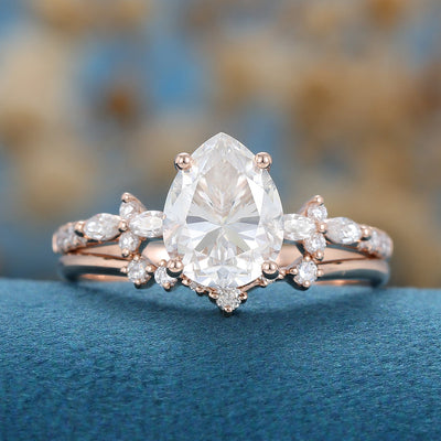 1-50-ct-pear-shaped-moissanite-solitaire-pave-bridal-set