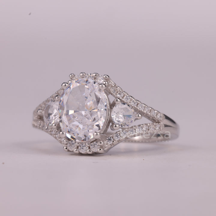1.0CT Oval Cut Three Stone Split Shank Pave Set Engagement Ring