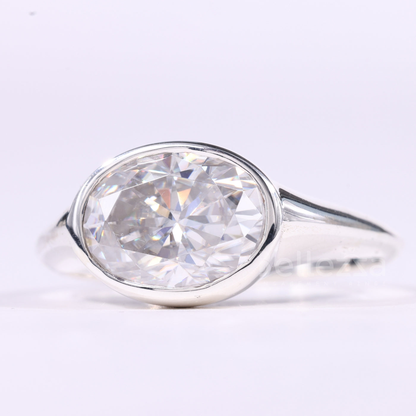 2.0CT East-West Oval Cut Bezel Set Solitaire Moissanite Engagement Ring