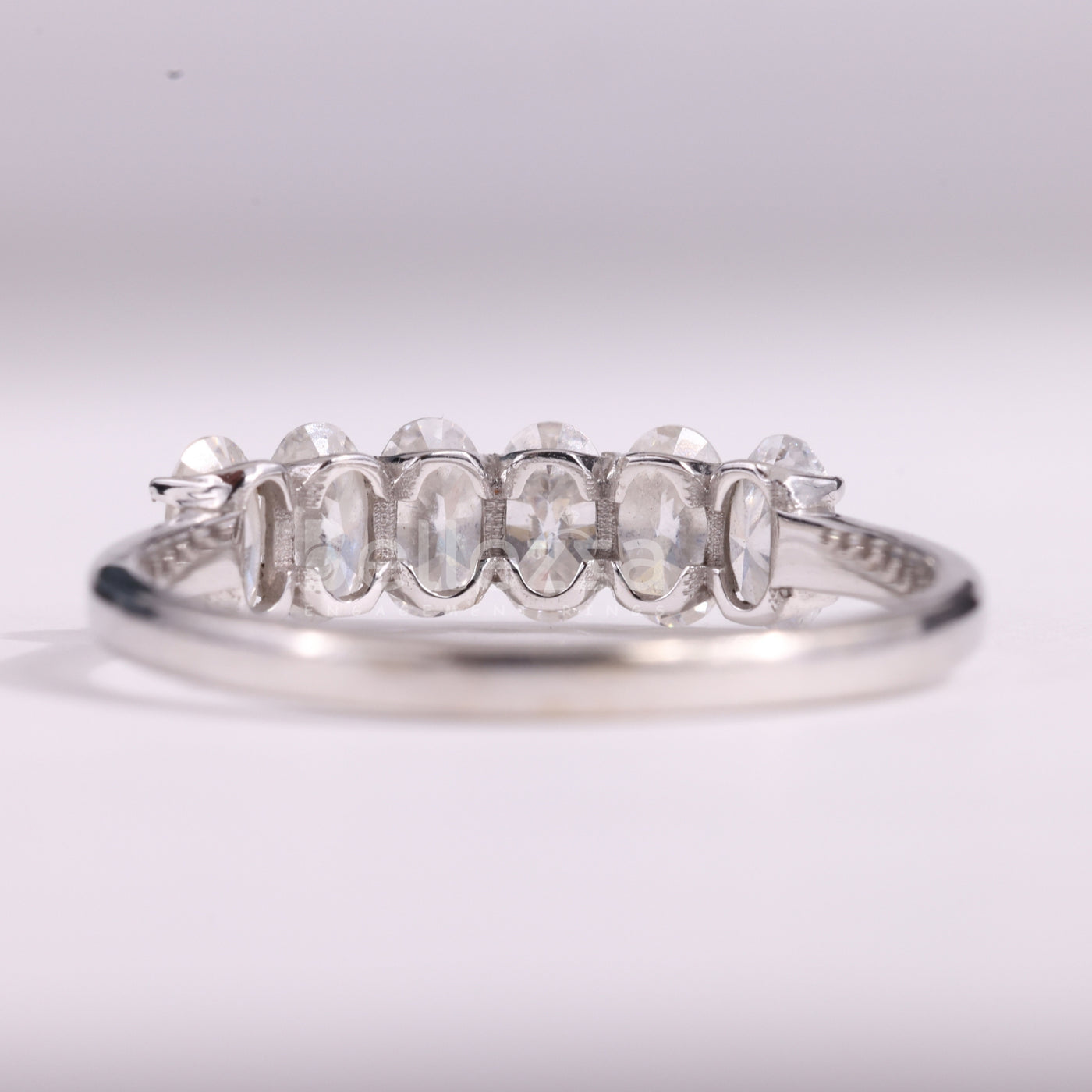 Oval Cut Six Diamond Moissanite Wedding Band