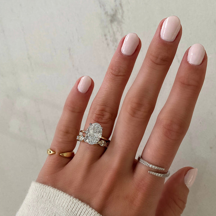 Oval Cut Bezel Diamond Wedding Band For Women