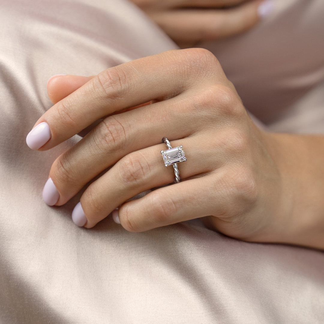 emerald-cut-hidden-halo-twisted-pave-setting-moissanite-engagement-ring
