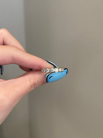 round-shaped-moissanite-bezel-half-eternity-wedding-band