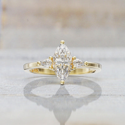 0.7 CT Marquise Cut Moissanite Three Stone Engagement Ring