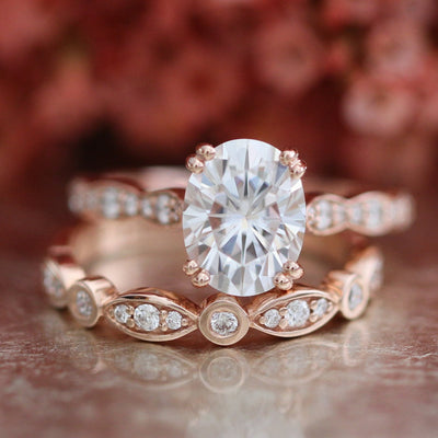 2.0ct Oval Moissanite Double Claw Ring with Matching Wedding Band