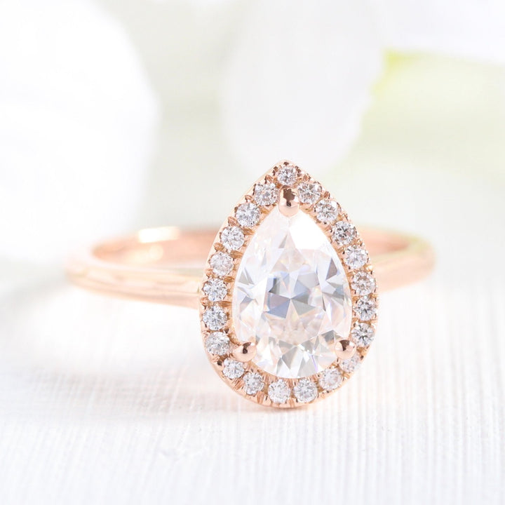 Pear Cut Moissanite Ring With Scalloped Diamond Band