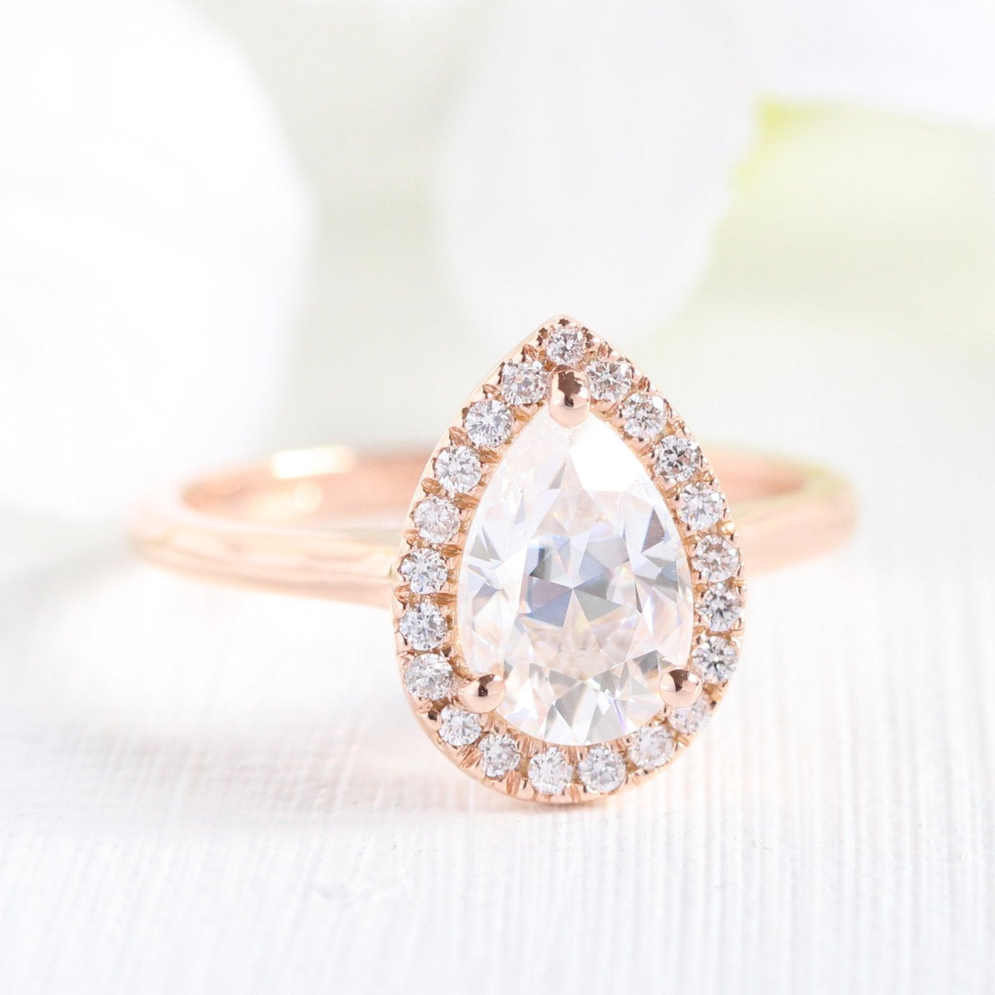 Pear Cut Moissanite Ring With Scalloped Diamond Band