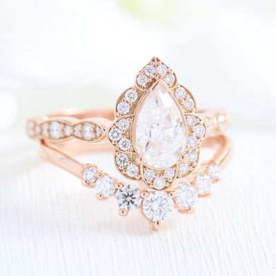 Pear Cut Moissanite Ring With Curve Diamond Band