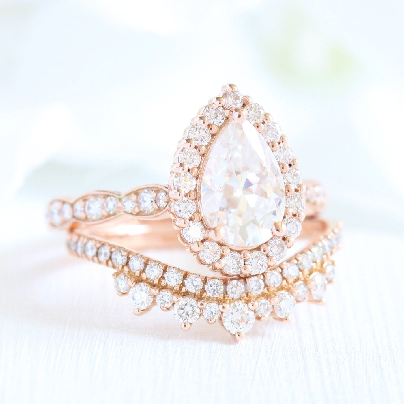 1.50ct Pear Cut Moissanite Halo Ring With Crown Diamond Band