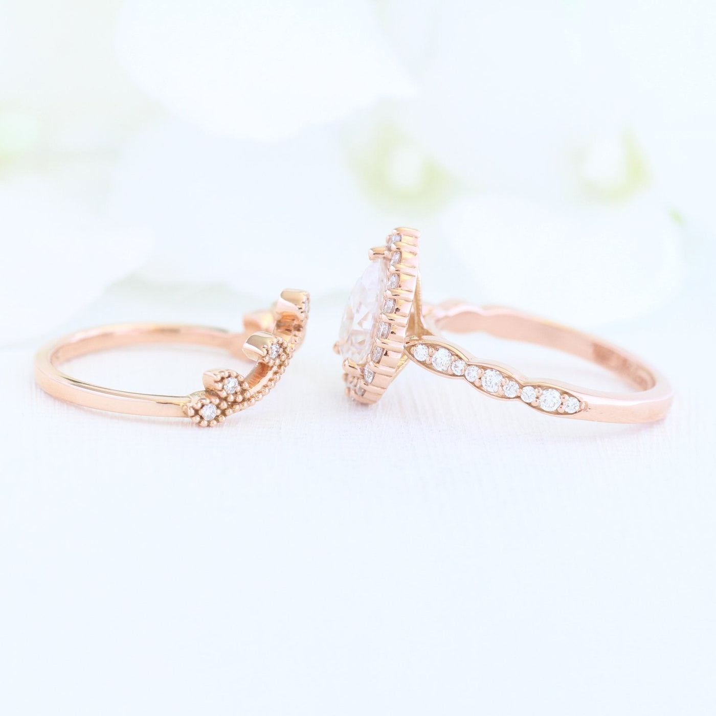 Pear Cut Moissanite Ring With curved leaf Diamond Band