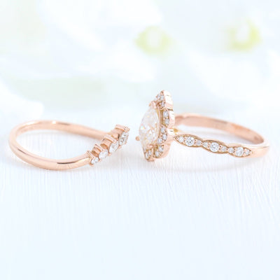 Pear Cut Moissanite Ring With Curve Diamond Band