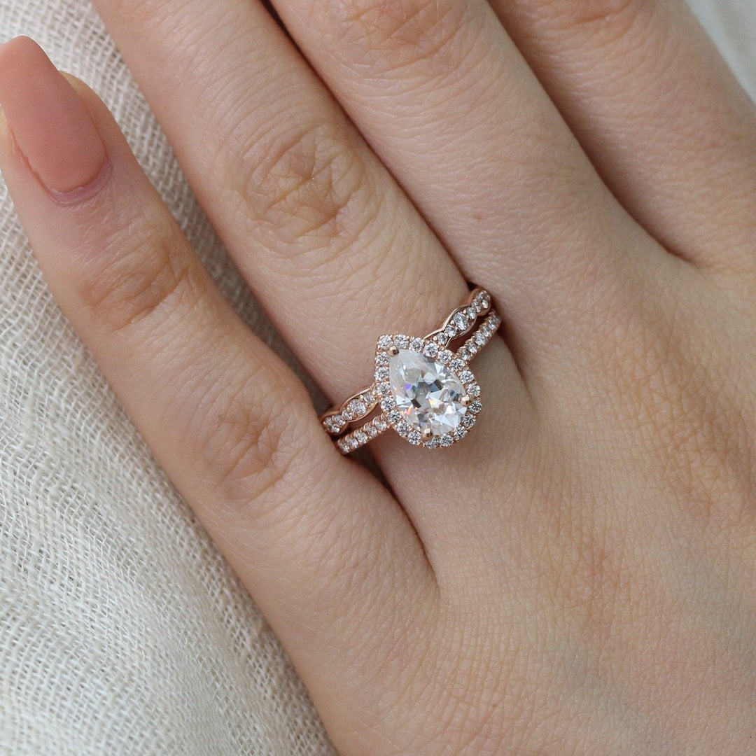 Pear Cut Moissanite Ring With Diamond Band