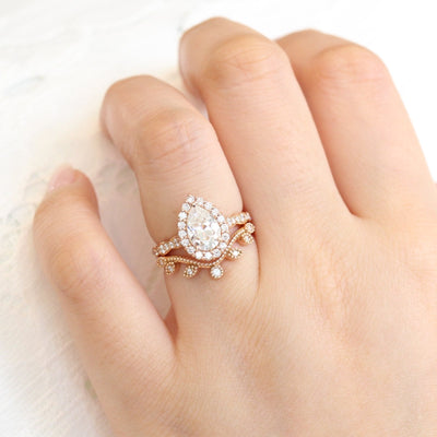 Pear Cut Moissanite Ring With curved leaf Diamond Band