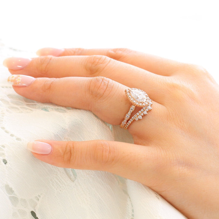 1.50ct Pear Cut Moissanite Halo Ring With Crown Diamond Band