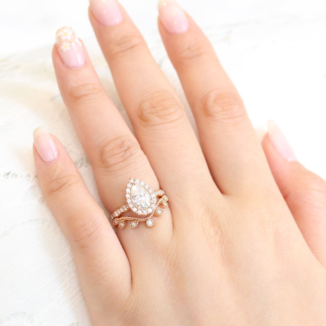 Pear Cut Moissanite Ring With curved leaf Diamond Band