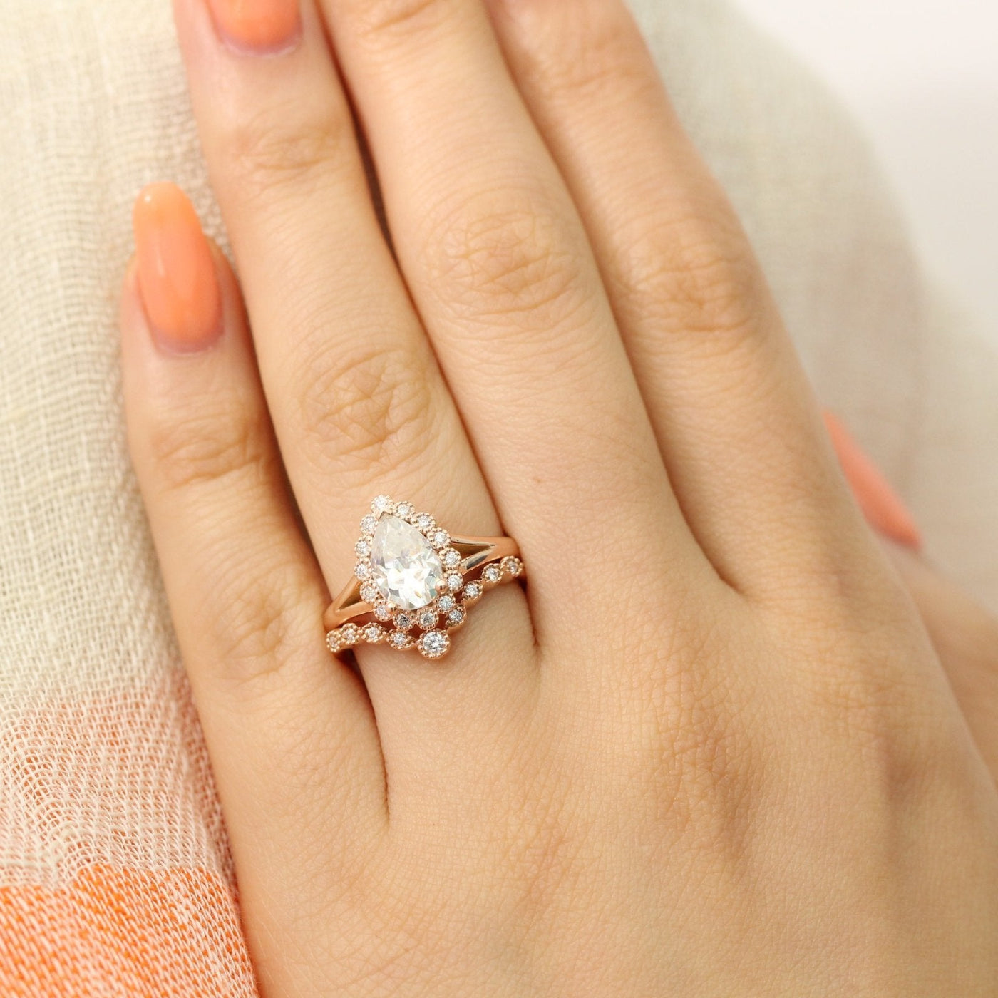 Pear Cut Moissanite Ring With Curve Halo Diamond Band