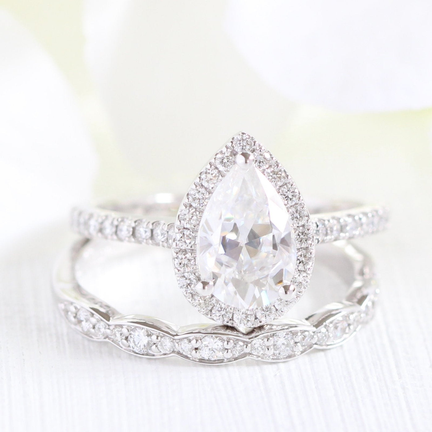 Pear Cut Moissanite Ring With Diamond Band